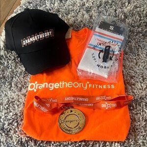 Orangetheory shirt, medal, socks, hat bundle